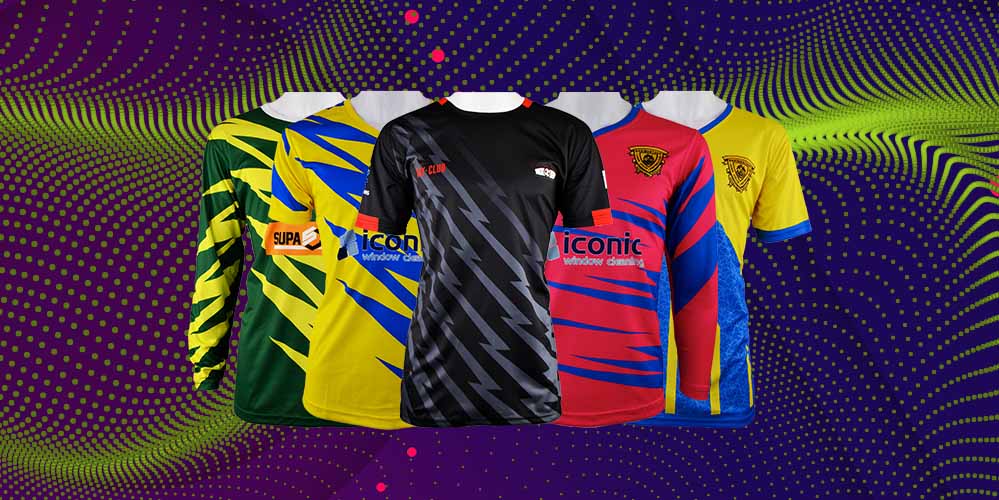 Five colourful custom football kits with bold geometric patterns are displayed side by side against a vibrant, abstract background with green and purple dotted waves. The personalised football kits feature yellow, red, blue, black, and multicoloured designs.