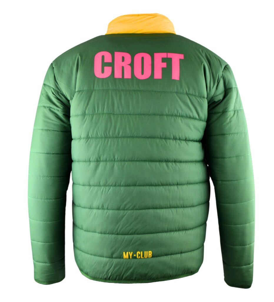 A green puffer jacket with a yellow collar, the word CROFT in large pink letters on the upper back, and MY-CLUB in small yellow text near the bottom hem.
