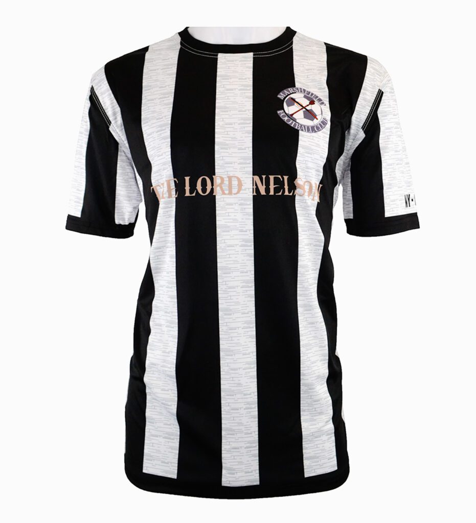 A black and white vertically striped football shirt with short sleeves, a circular club crest on the left chest, and THE LORD NELSON text printed across the front.