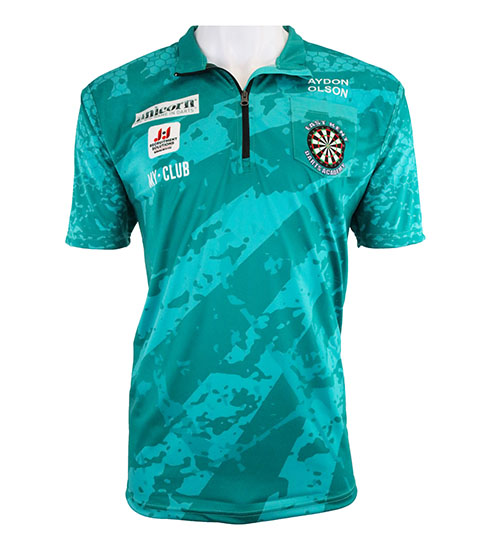 A teal short-sleeve sports jersey with a half-zip collar, featuring abstract light patterns, sponsor logos, and a dartboard emblem with text on the left chest. Displayed on a headless mannequin.