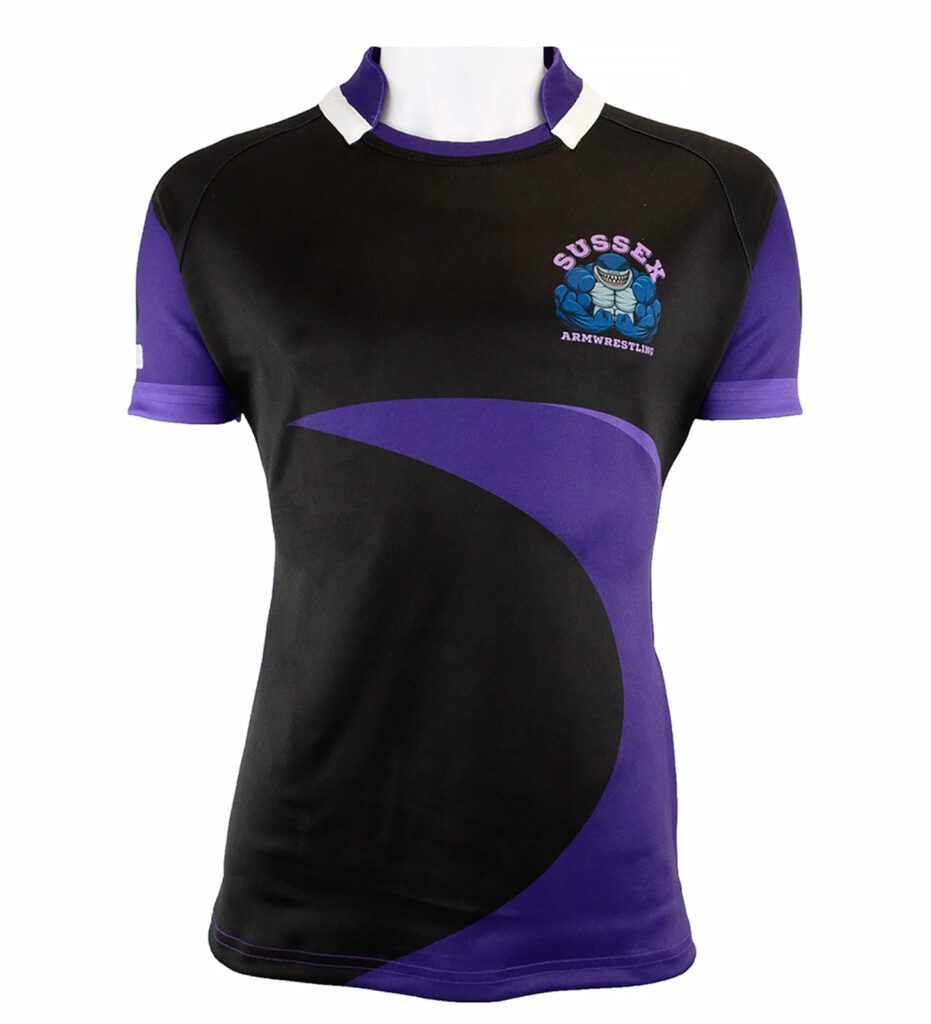 A black and purple short-sleeved sports jersey with Sussex Armwrestling and a cartoon armwrestler flexing on the chest, displayed on a mannequin torso.