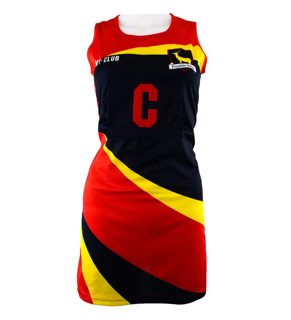 A sleeveless netball dress with red, black, and yellow diagonal stripes, a large red C on the front, and team logos on the chest.