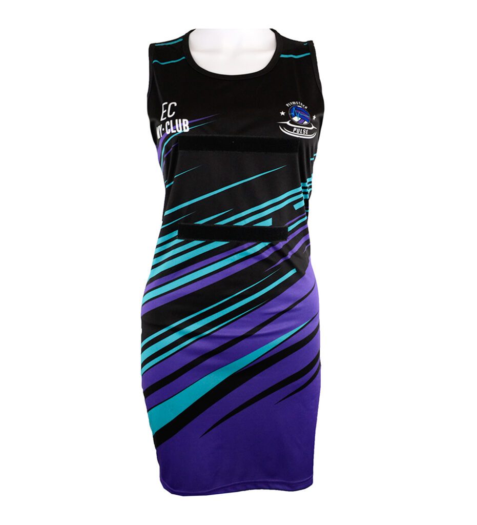 A sleeveless netball dress with black, teal, and purple diagonal stripes, featuring an EC and Net Club logo on the chest and a team emblem on the right side. The dress is displayed on a mannequin torso.